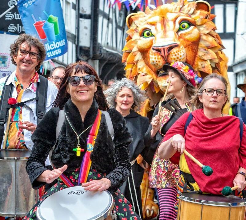 Lion puppet and samba band in the town of Leominster