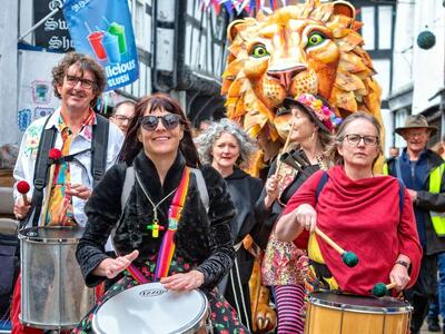 Lion puppet and samba band in the town of Leominster