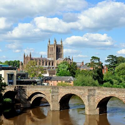 Old bridge over the River Wye with Hereford Cathedral in the background